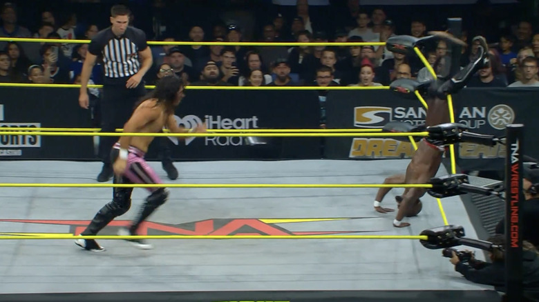 Swann about to springboard using the ropes