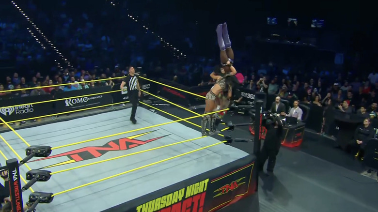 All four women teetering on the ropes