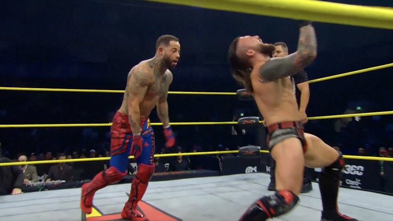 Miguel and Hotch both inside the ring