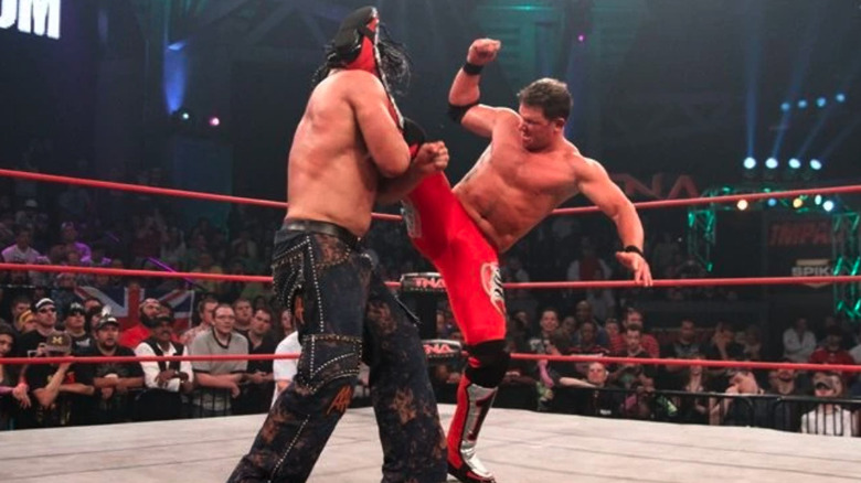 AJ Styles kicks Matt Hardy in the head at TNA Victory Road 2011