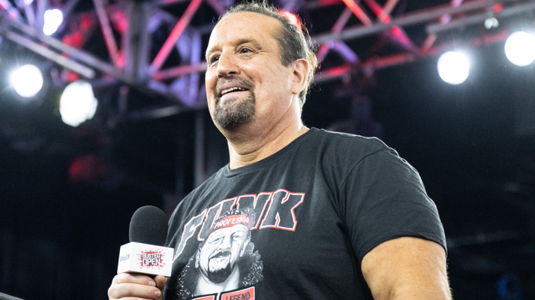 Tommy Dreamer is wearing a black t-shirt
