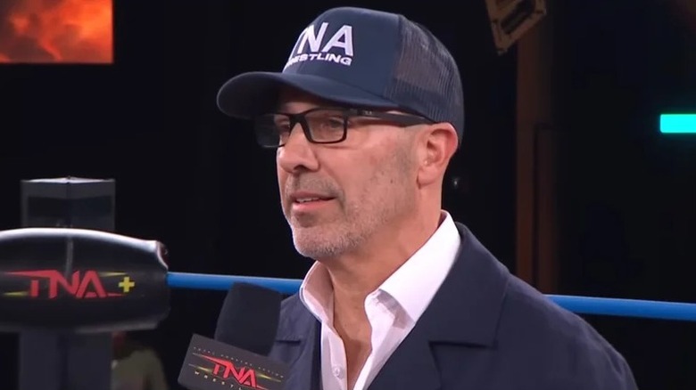TNA President Carlos Silva speaks in the middle of the ring