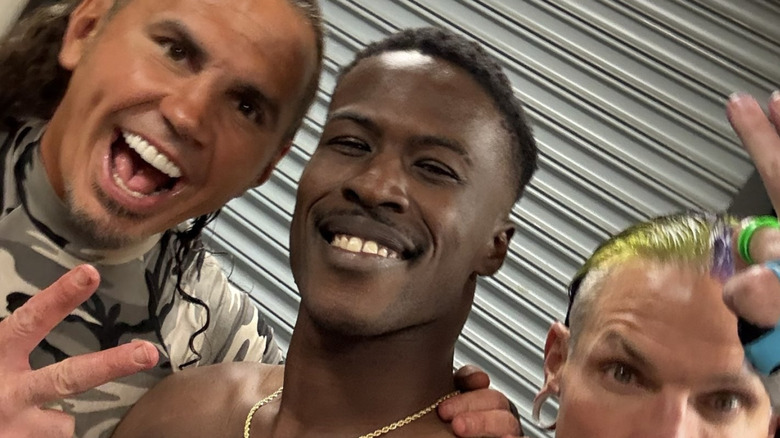 BDE posing with Matt and Jeff Hardy