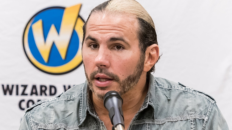 Matt Hardy speaking into a microphone