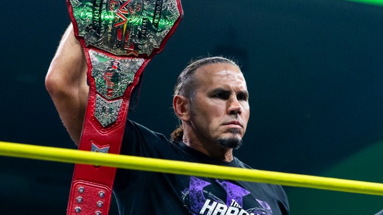 Former TNA World Tag Team Champion Matt Hardy holds up the championship as he awaits his next set of challengers