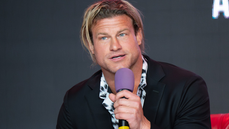 Nic Nemeth holding a microphone