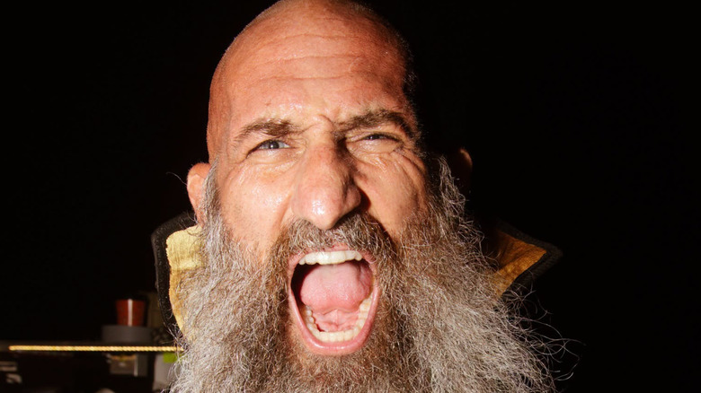 Tommaso Ciampa, either screaming into the void or into AEW's backstage area