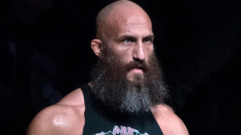 Tommaso Ciampa wearing a black muscle tee