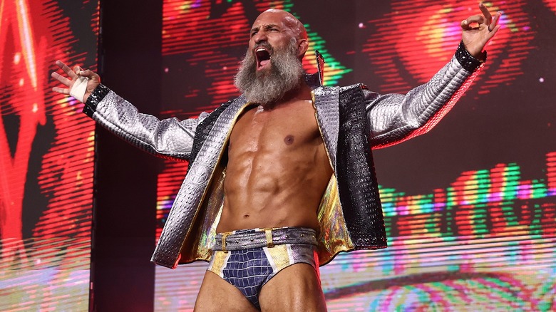 Tommaso Ciampa posing at the top of the stage ramp before a match on 