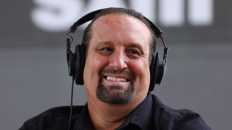 Tommy Dreamer smiling while wearing a headset