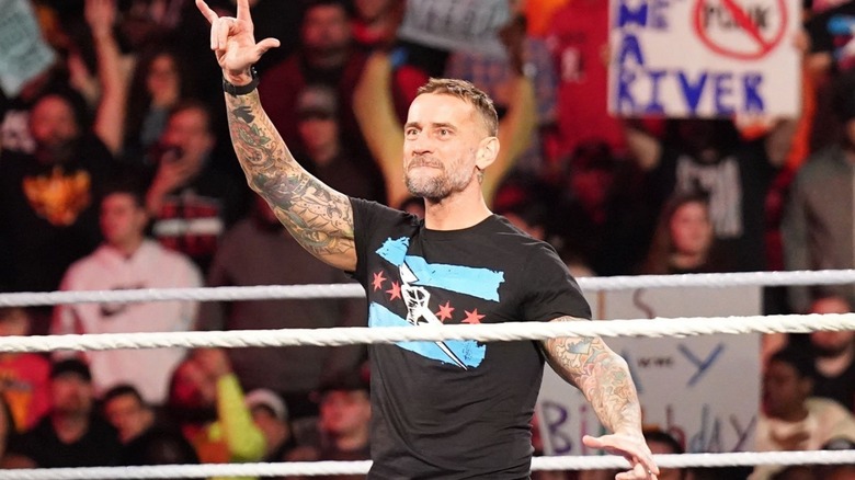 CM Punk flashes signs of love to the WWE Universe