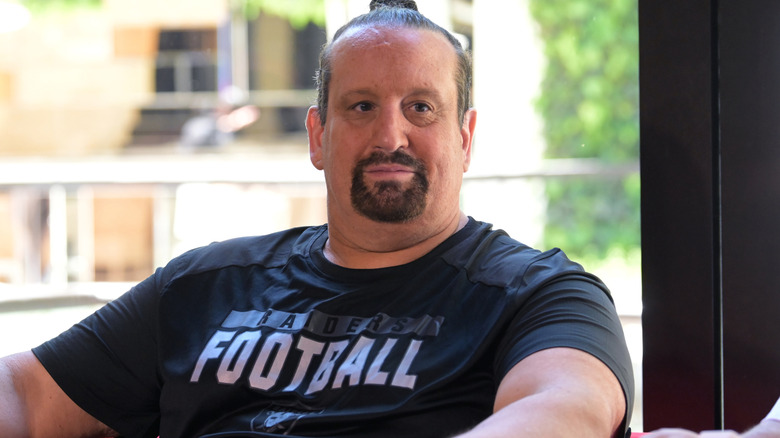 Tommy Dreamer is wearing a black t-shirt