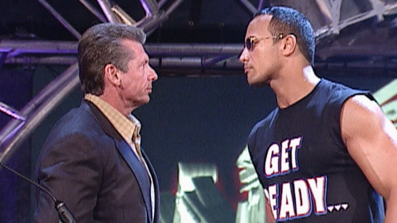 Vince McMahon and The Rock face to face