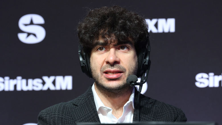 Tony Khan shows off the headset