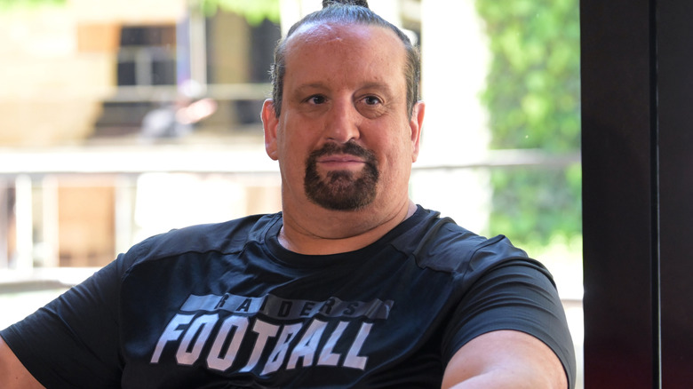 Tommy Dreamer is wearing a black t-shirt