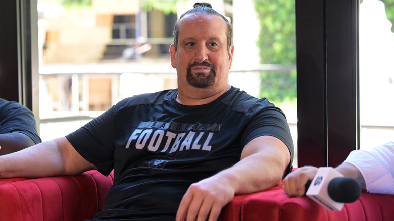 Tommy Dreamer at an event with a microphone