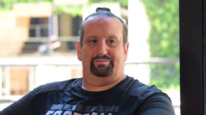 Tommy Dreamer sitting down