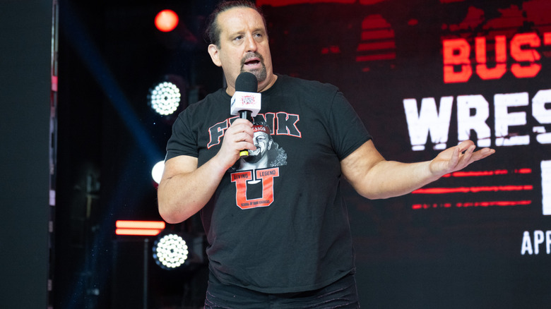 Tommy Dreamer speaking and shrugging