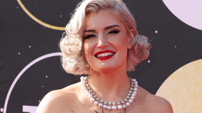 Toni storm smiling on the tcm red carpet