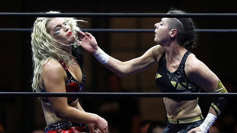 Charlie Morgan (r) of Great Britain fights Toni Storm of Australia during the Progress Wrestling Super Strong Style 16 final at Alexandra Palace on May 7, 2018 in London, England.