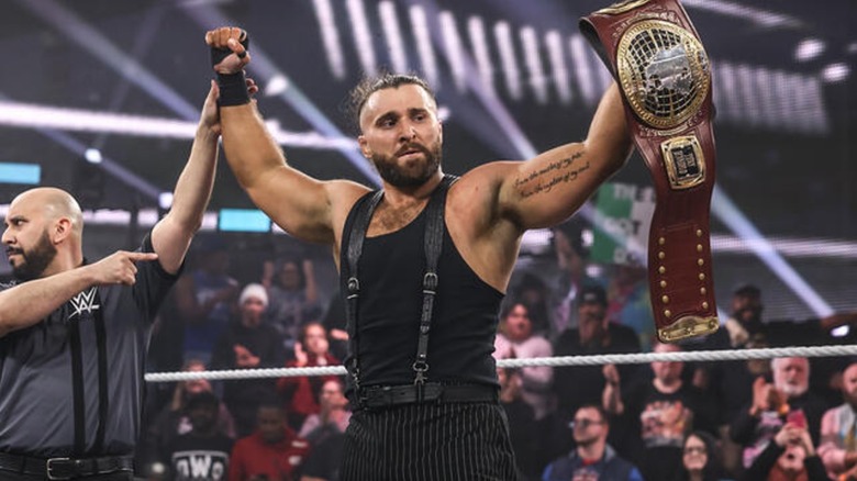Tony D'Angelo holding aloft NXT North American title