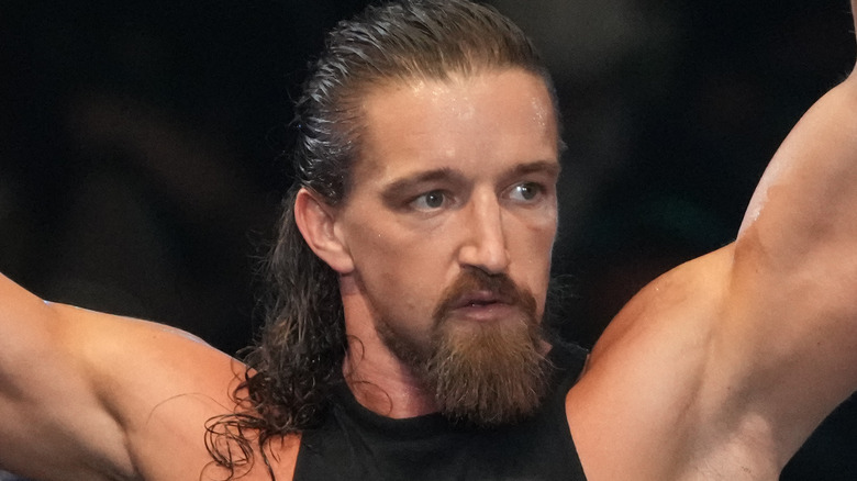 Jay White looking away