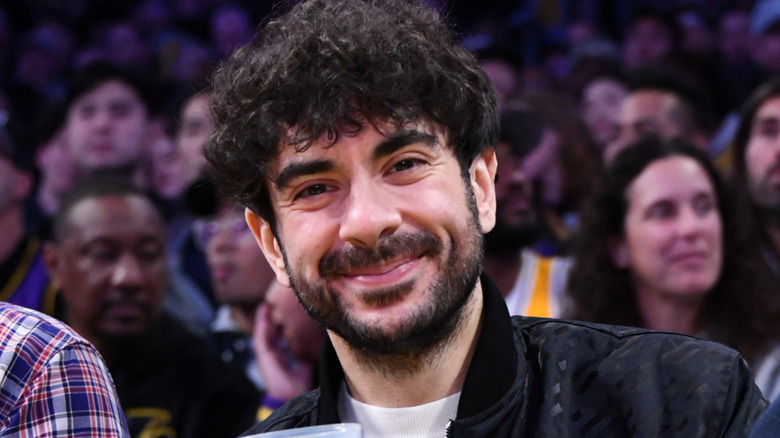 tony khan sitting courtside