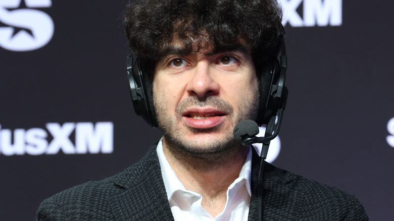 Tony Khan wearing a headset