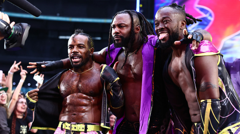 Austin Creed and Kofi, the New Level, pose alongside Swerve Strickland, before entering the trios gauntlet battle royal at AEW All In: London 2026.