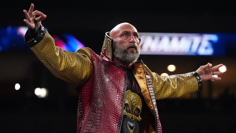 Tommaso Ciampa wearing a red ring jacket