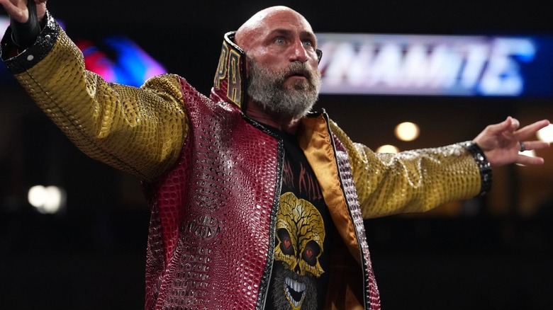 Tommaso Ciampa wearing a red ring jacket