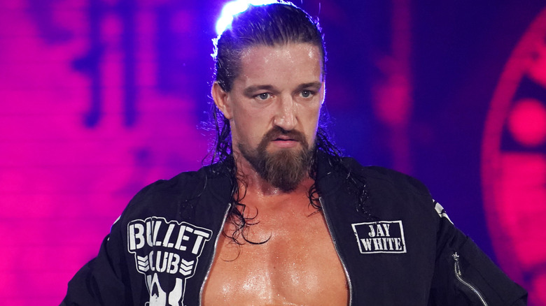 Jay White wearing a black jacket