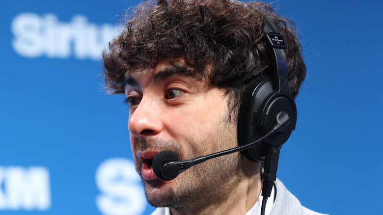Tony Khan wearing a headset