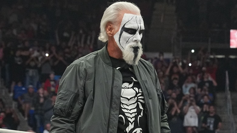 Sting staring at a downed Jon Moxley with his baseball bat during the AEW WrestleDream 2025 pay-per-view.