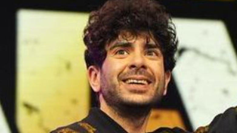 Tony Khan waving at AEW fans