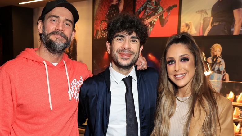 Tony Khan with CM Punk and Britt Baker