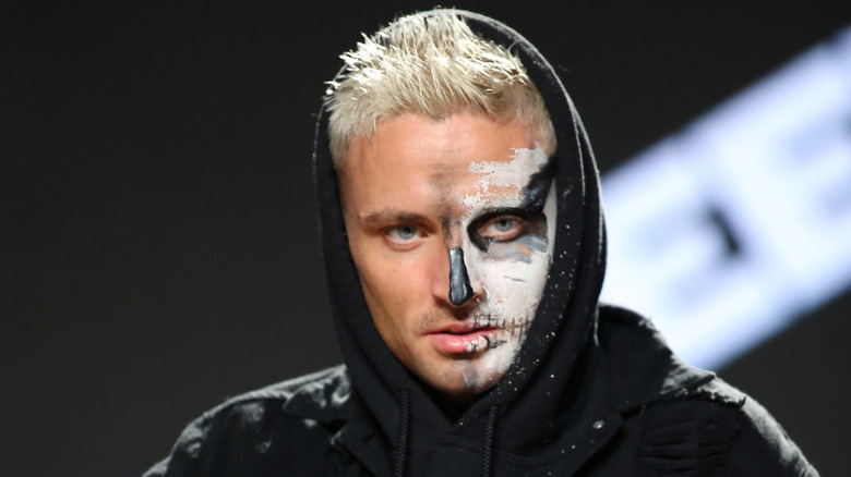 Darby Allin awaits a question during a media appearance