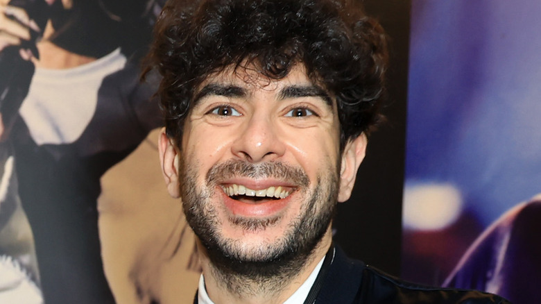 Tony Khan smiles