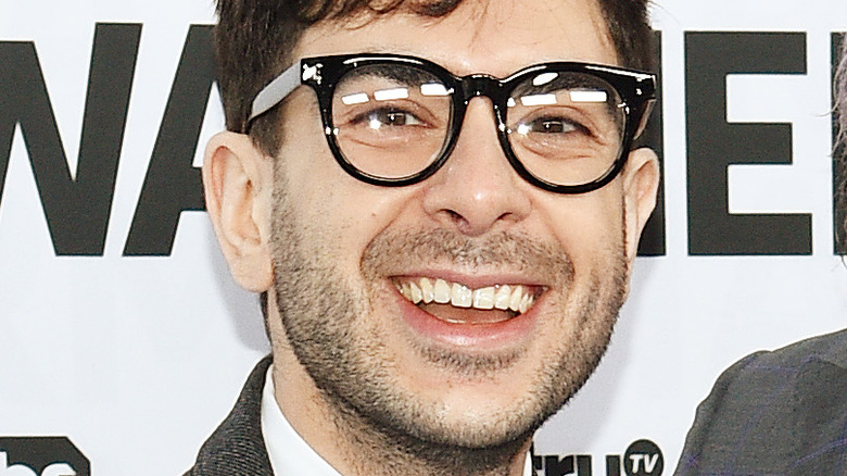 Tony Khan smiles