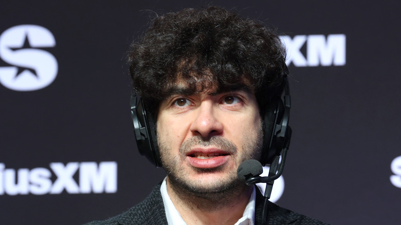 Tony Khan wearing a headset