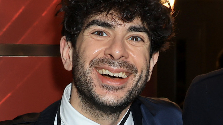 AEW CEO Tony Khan smiles