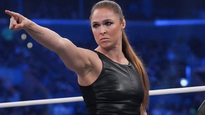 Ronda Rousey pointing towards Toni Storm moments after appearing in AEW during the AEW Revolution pay-per-view.