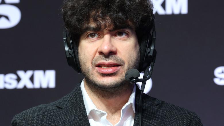 Tony Khan wearing a headset