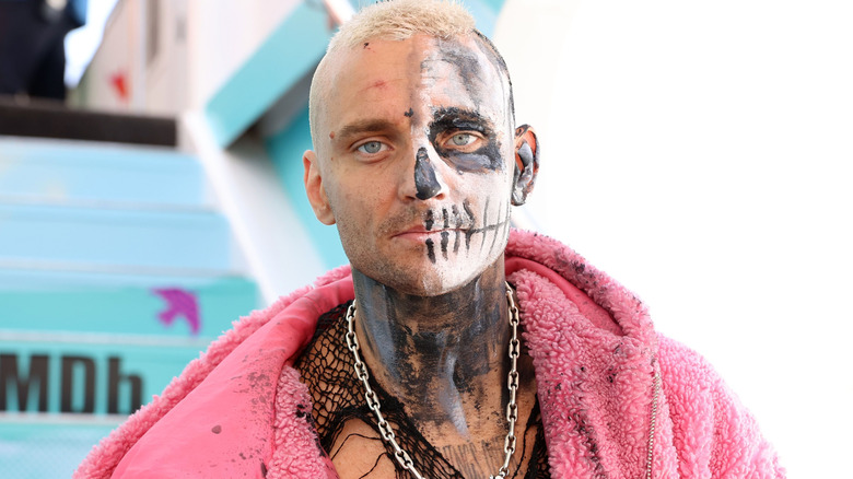 Darby Allin wearing black and white face paint