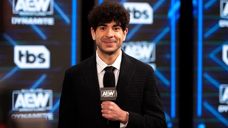 Tony Khan, with a microphone in hand, gets ready to make an important announcement
