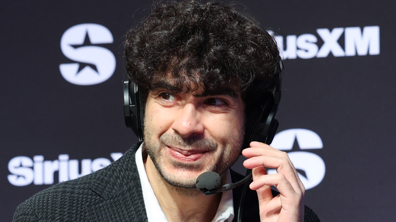 Tony Khan on a headset