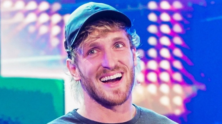 Logan Paul is entertained coming to the ring