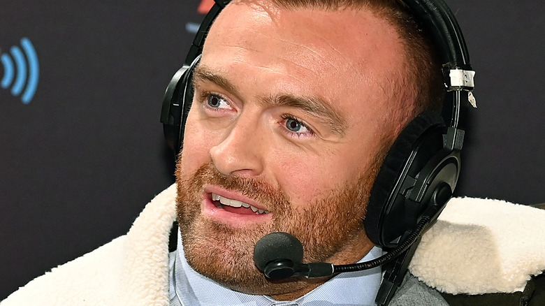 Nick Aldis talks on mic