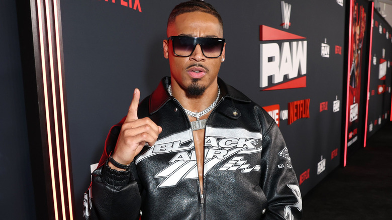 Carmelo Hayes wearing sunglasses