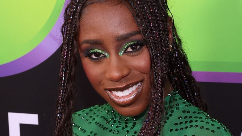 Trinity Fatu posing on the red carpet